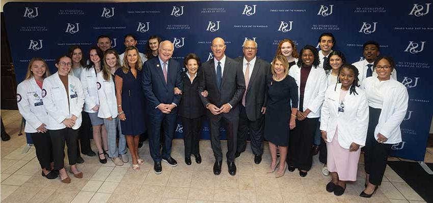 Elliot B. Maisel, President Bonner, Vice President Kent, and medical staff.